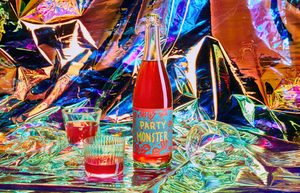 
                  
                    Load image into Gallery viewer, 2022 Dorn Vineyard ‘Party Monster’ Pet Nat Sparkling Rosé on iridescent backdrop with glasses
                  
                