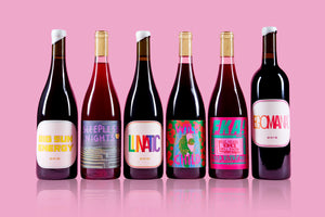 six assorted red bottles on pick background The 'All Reds' Pack